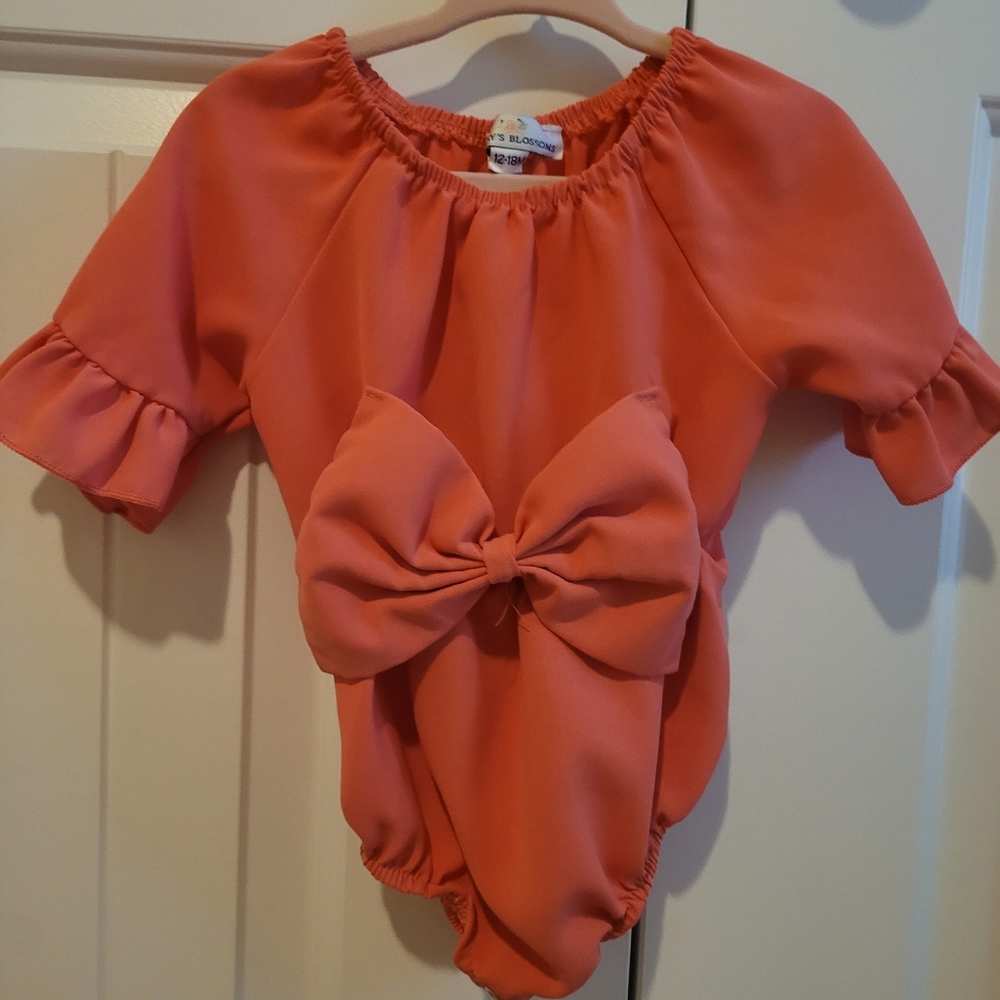 Adorable Bailey's Blossom ruffled with bow onesie size 12-18 months